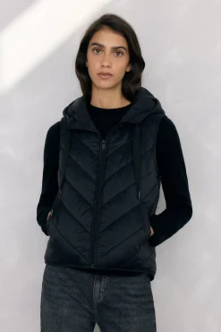 Abrigo y chaleco interior