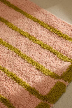 Alfombra de baño a rayas rosas Saturno