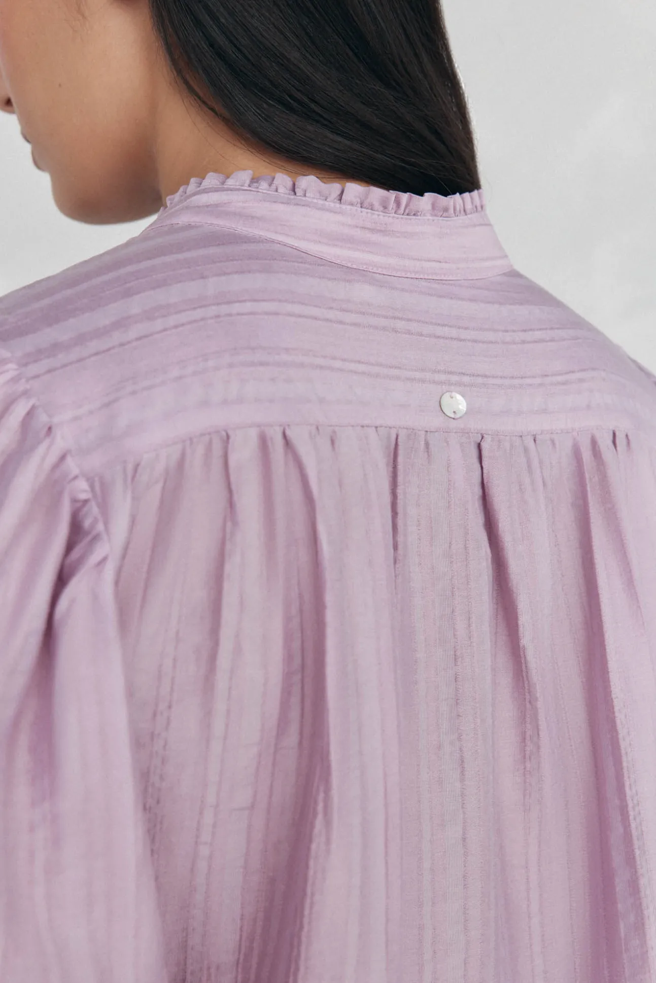 Blusa amplia lisa