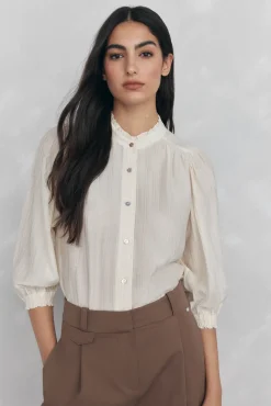 Blusa amplia lisa