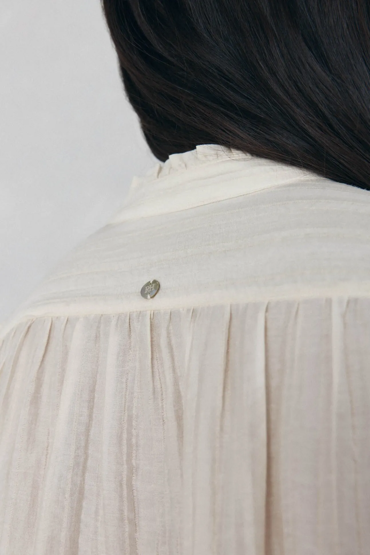 Blusa amplia lisa