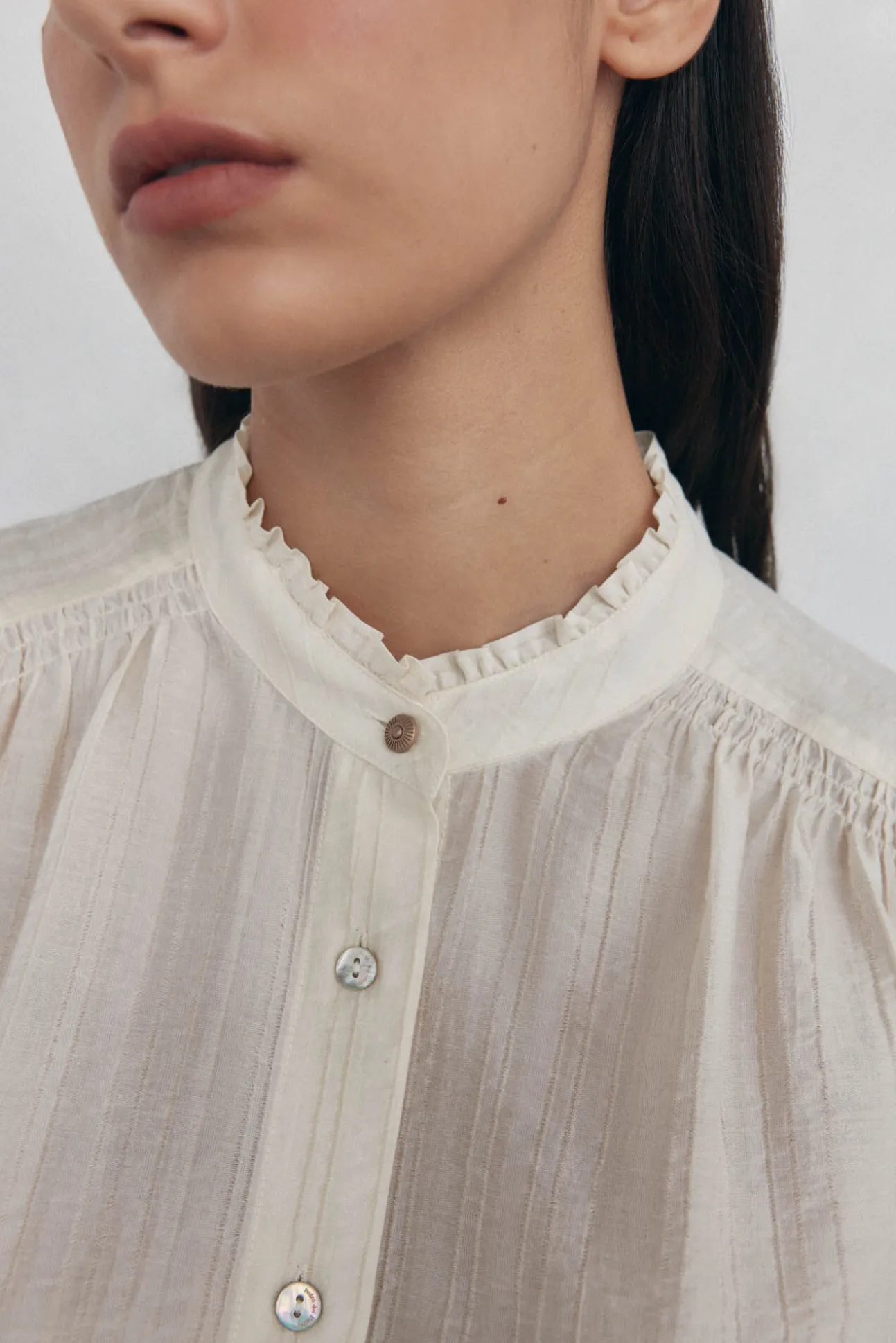 Blusa amplia lisa