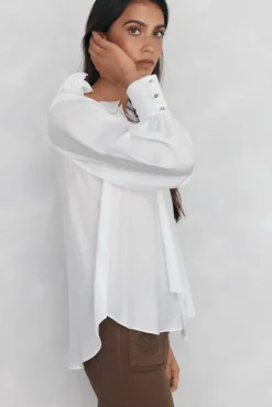 Blusa amplia lisa