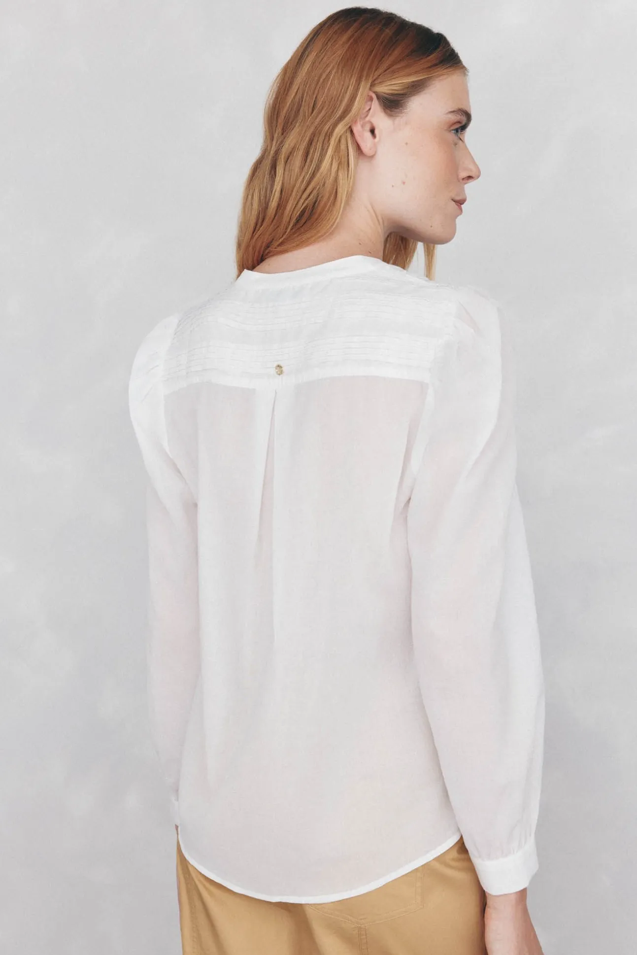 Blusa amplia lisa