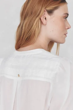 Blusa amplia lisa