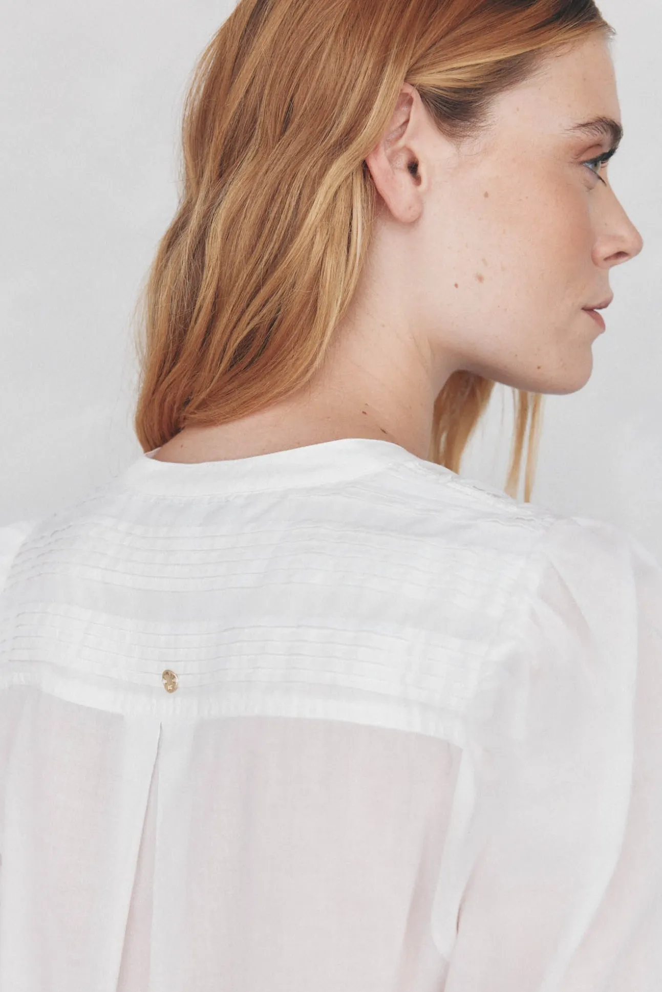 Blusa amplia lisa