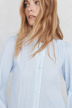 Blusa amplia lisa