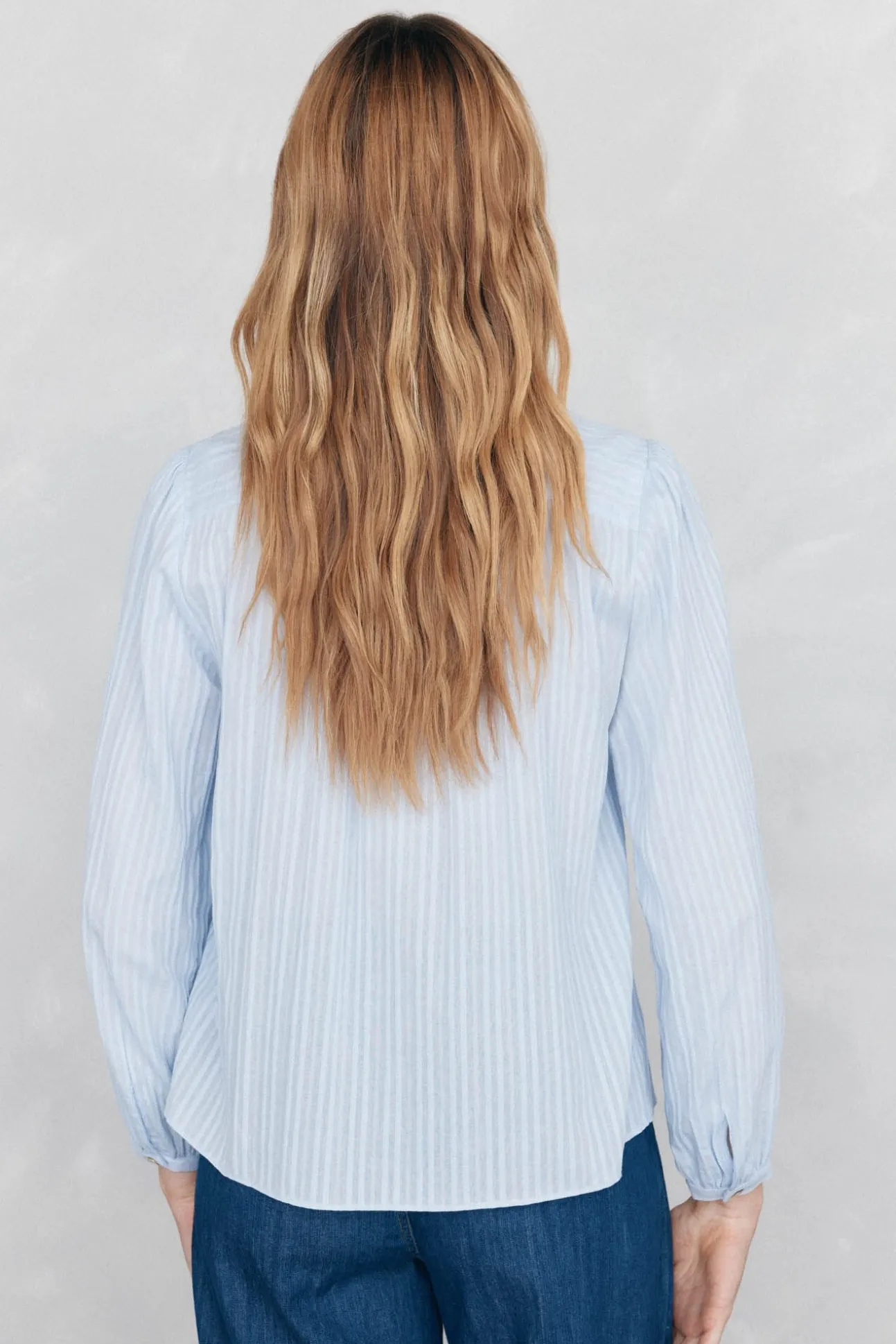 Blusa amplia lisa