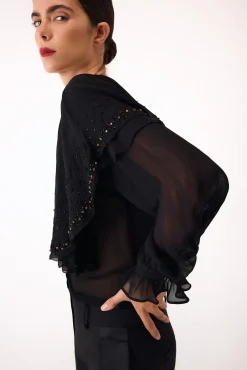 Blusa bordada capa