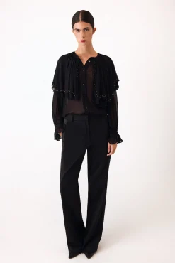 Blusa bordada capa