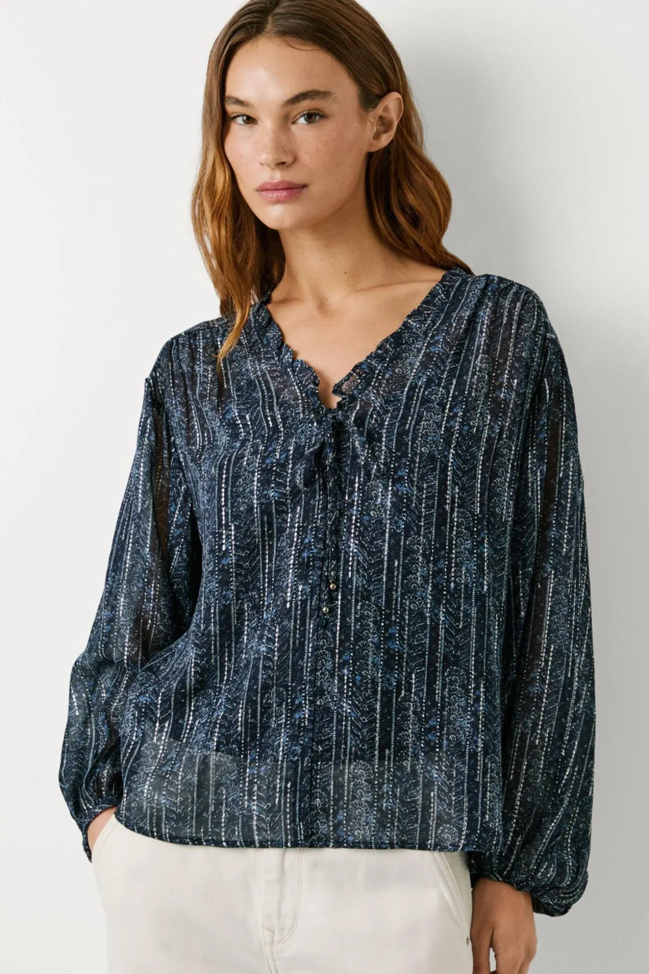 Blusa Con Detalles Metalizados