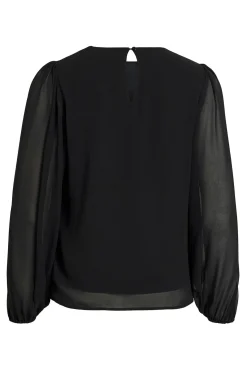 Blusa de gasa con pedrería en el cuello