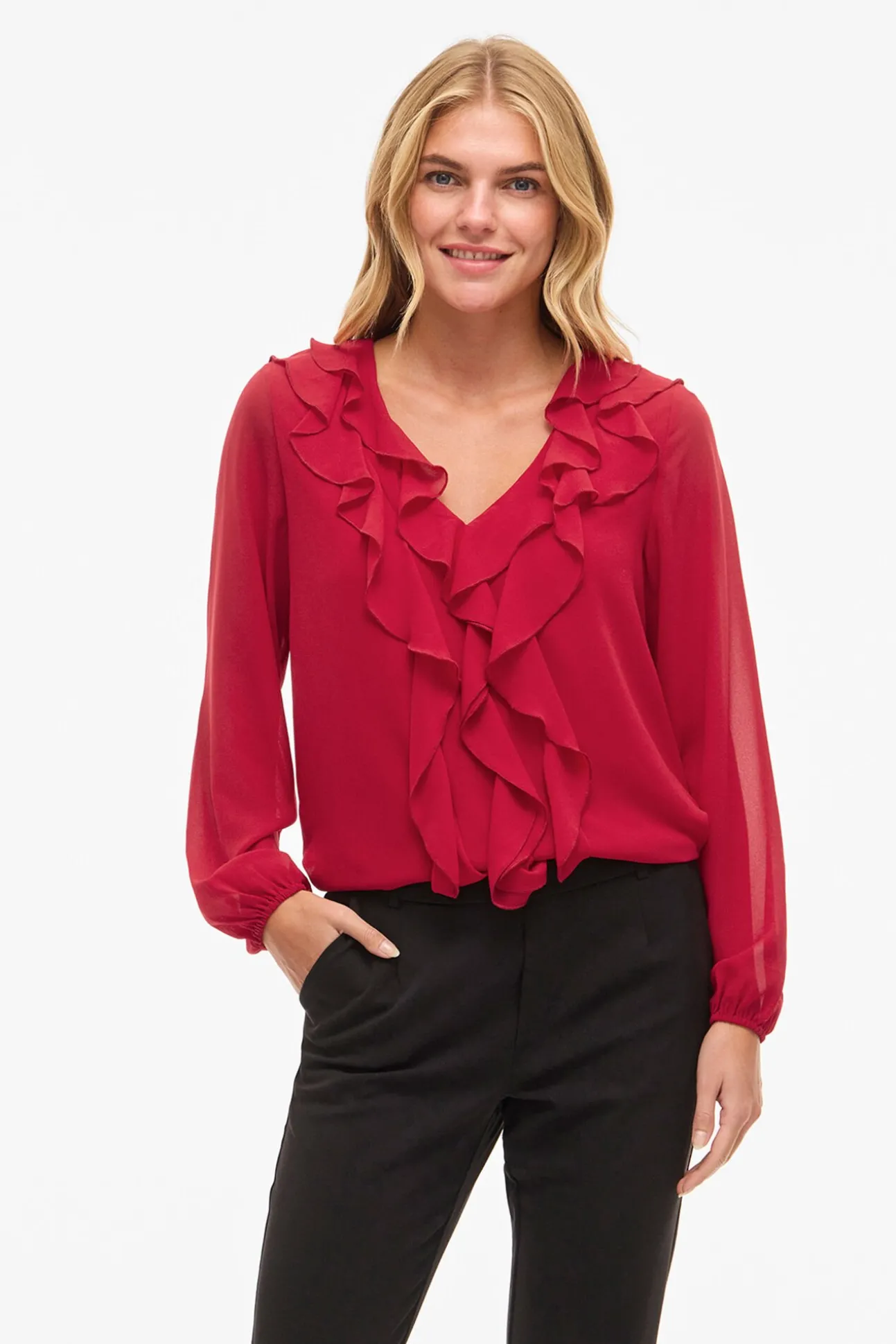 Blusa de manga larga con volantes
