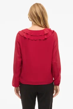 Blusa de manga larga con volantes