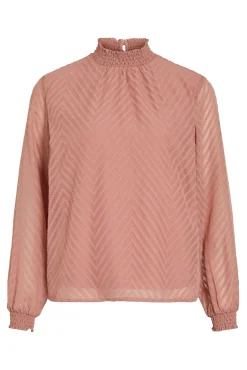 Blusa de manga larga con cuello alto