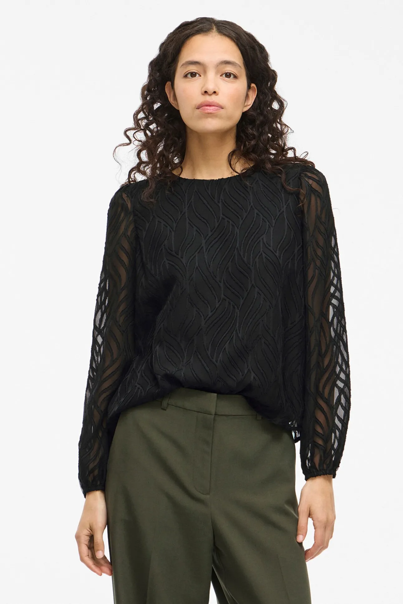 Blusa manga larga con cuello redondo
