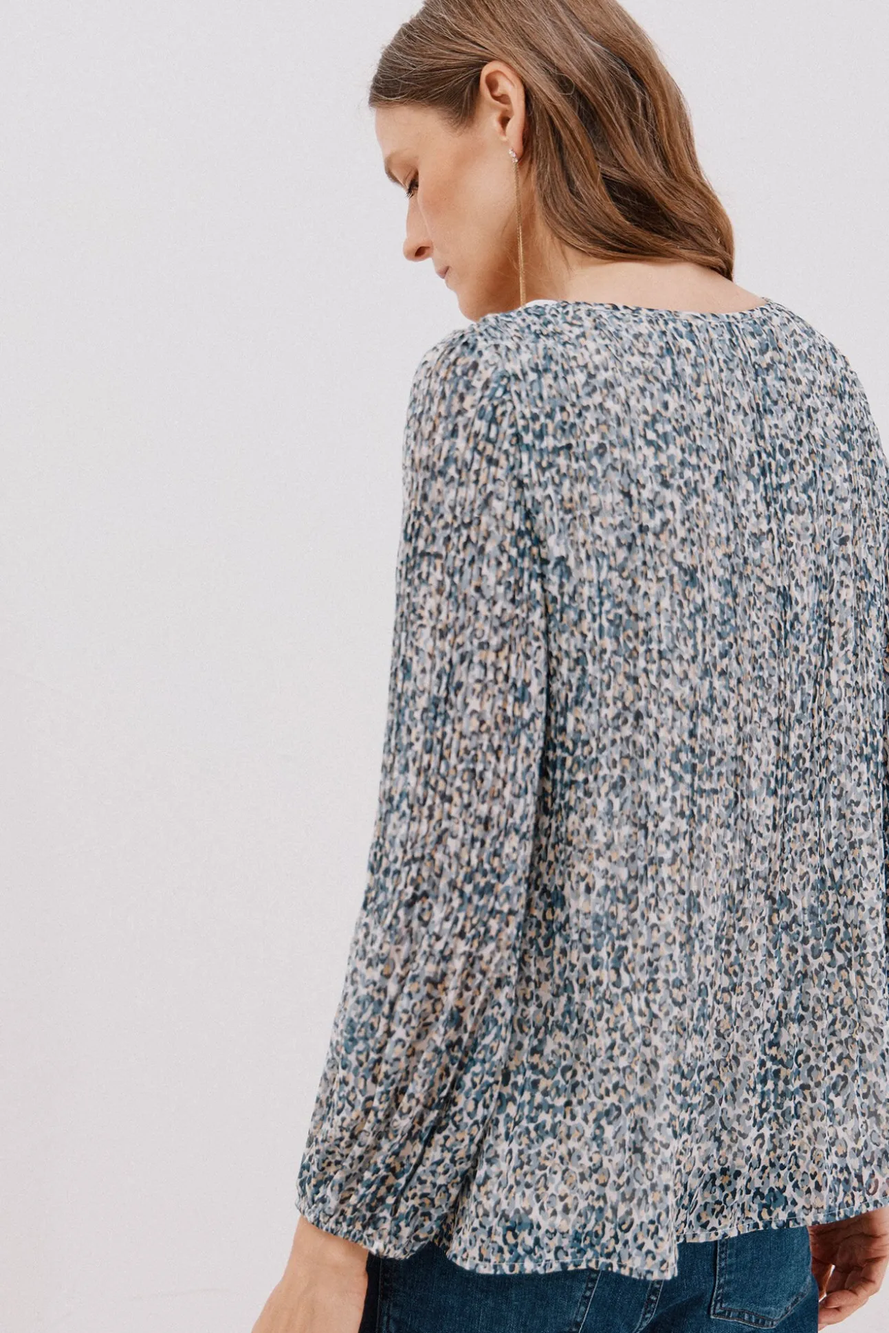 Blusa plisada