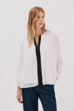 Blusa plisada contraste