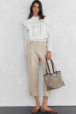 Blusa romántica volante