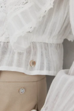 Blusa romántica volante