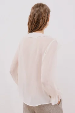 Blusa volante delantero