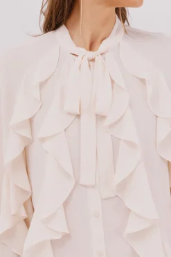 Blusa volante delantero