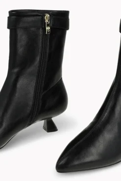 Botines efecto piel con adorno