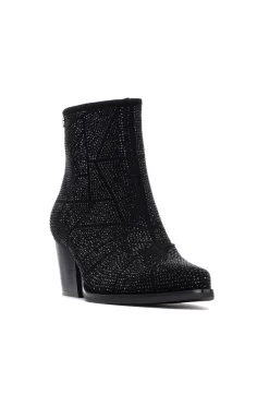 Botín cowboy tachas