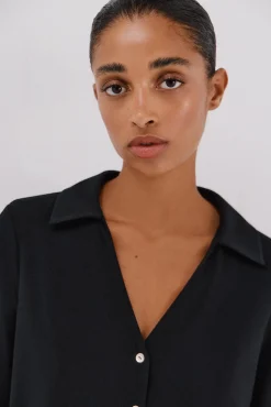 Camisa elástica botones