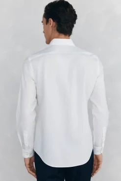 Camisa vestir lisa non iron + antimanchas slim fit