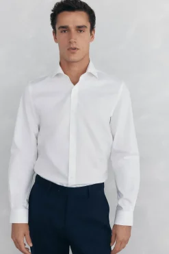 Camisa vestir lisa non iron + antimanchas