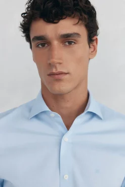 Camisa vestir lisa non iron + antimanchas