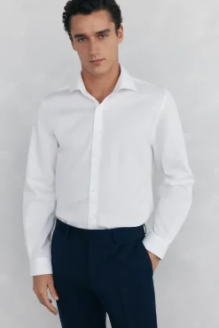 Camisa vestir lisa non iron + antimanchas