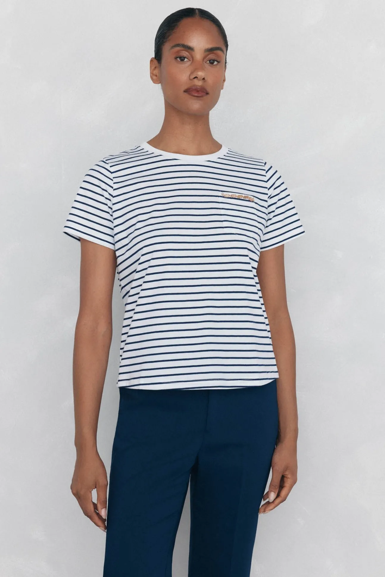 Camiseta bolsillo cadena