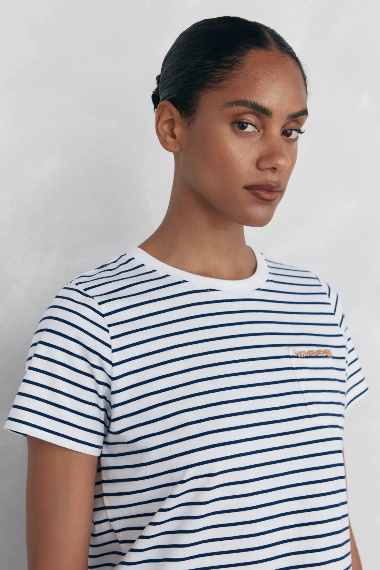 Camiseta bolsillo cadena