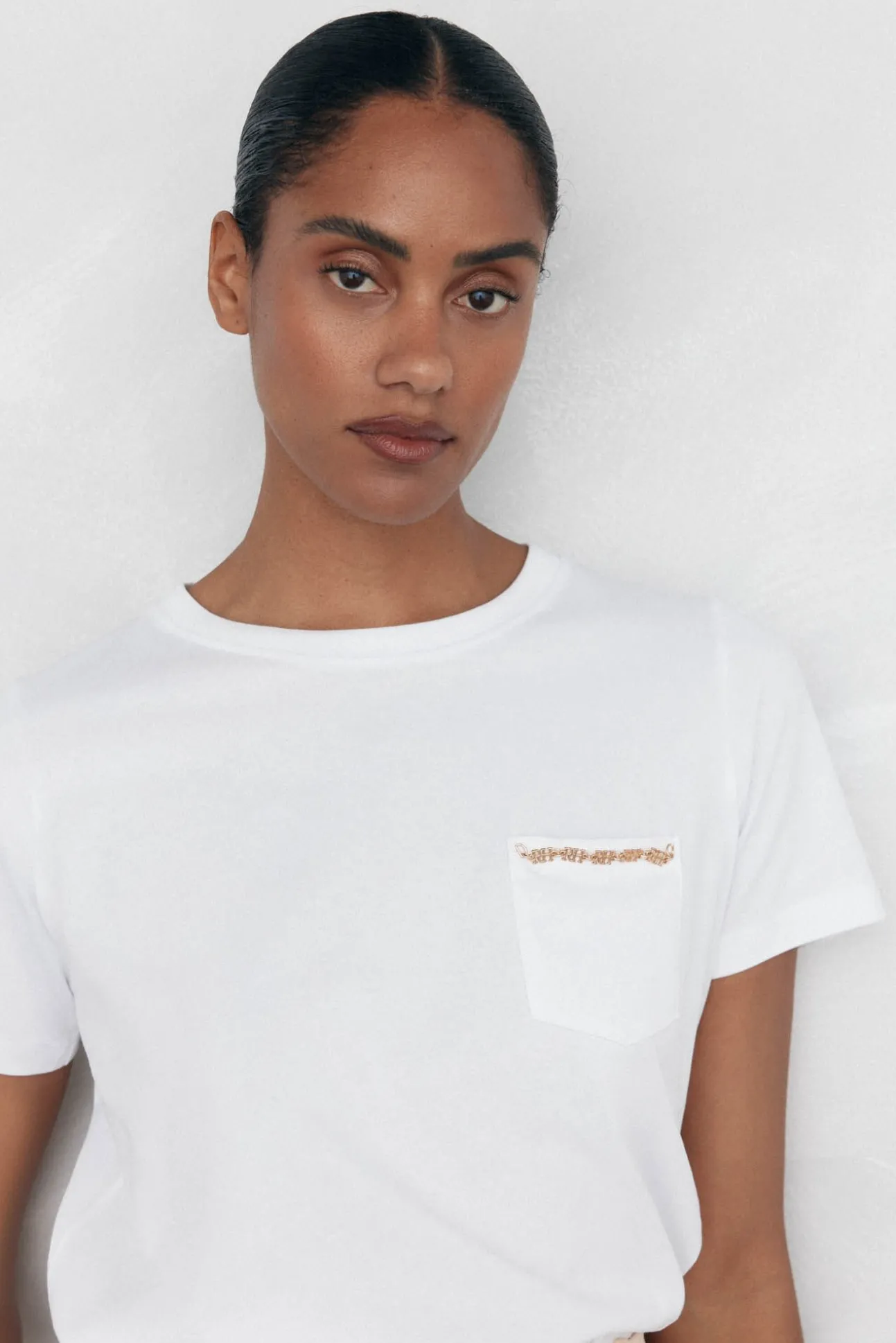 Camiseta bolsillo cadena