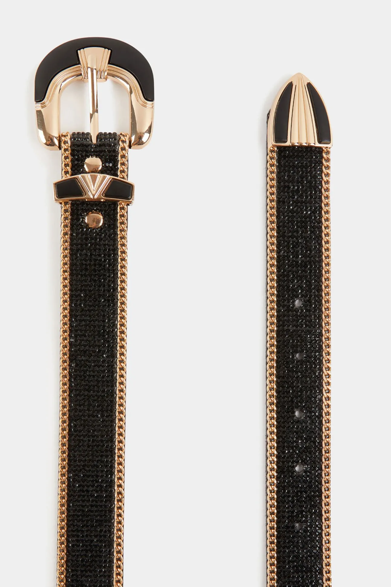 Cinturón con strass y cadenas