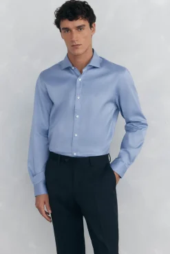 Conjunto de pantalón y camisa