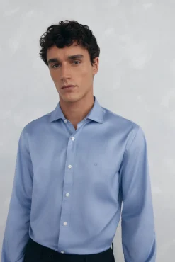 Conjunto de pantalón y camisa