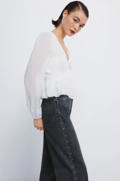 Jeans wide tachas