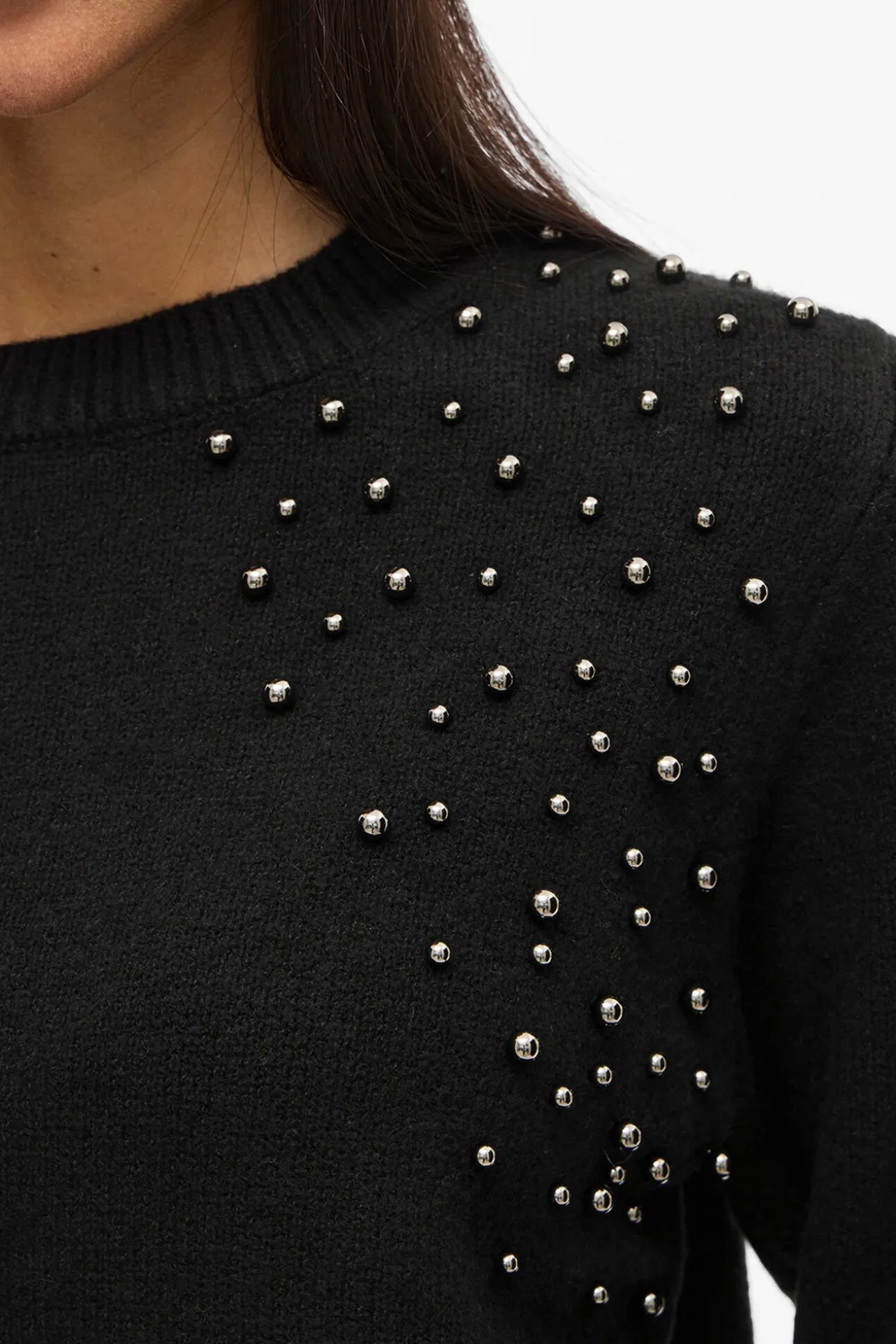 Jersey de punto con tachas