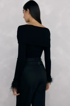 Jersey plumas puño