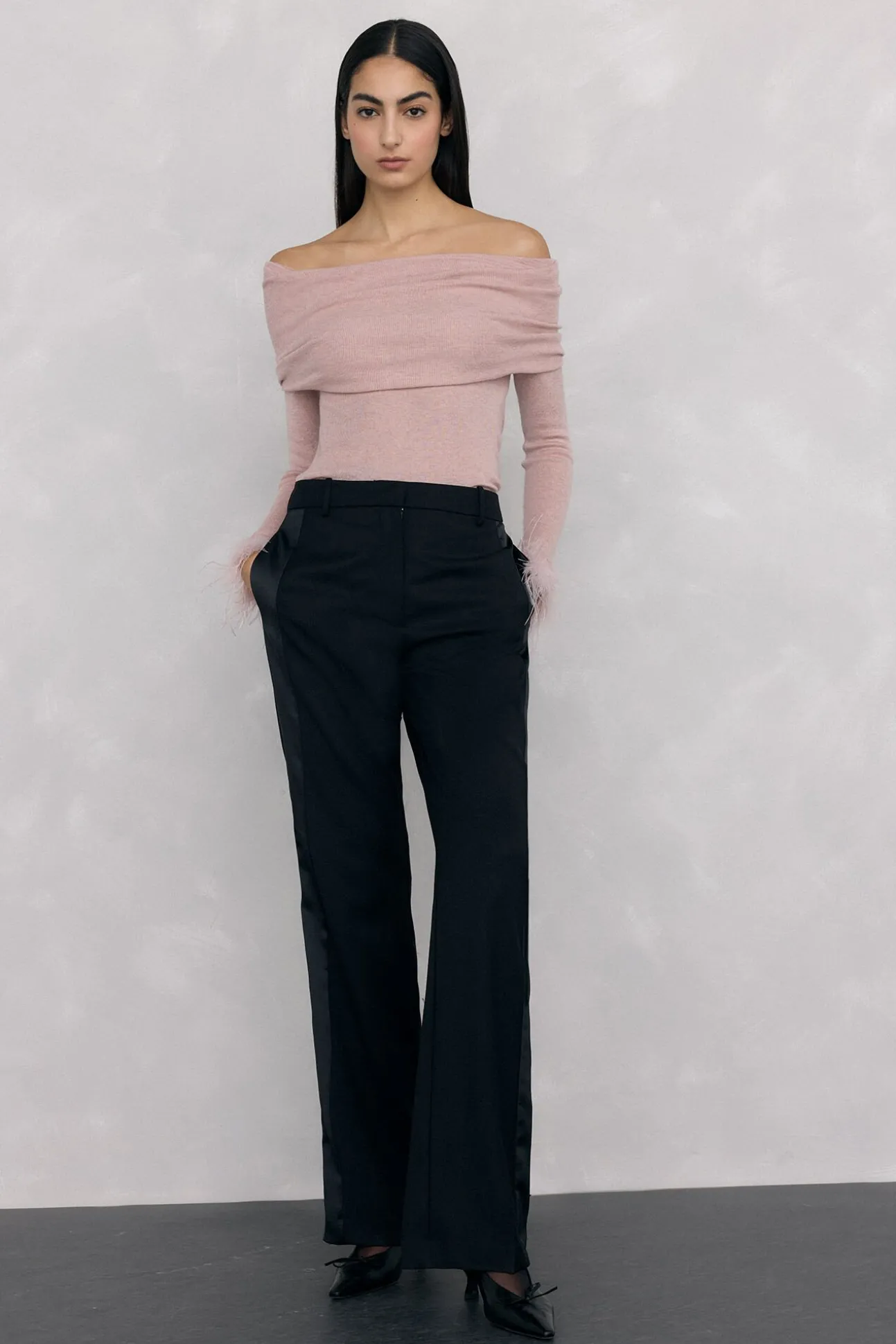 Jersey plumas puño