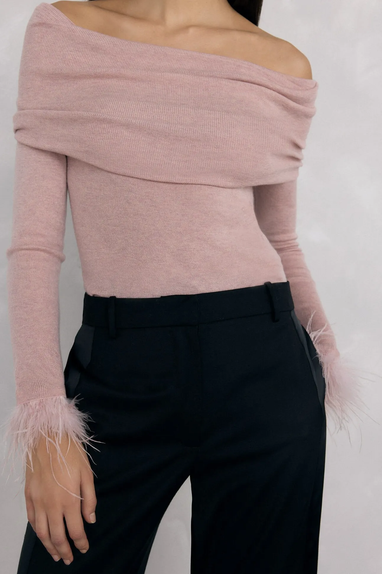 Jersey plumas puño