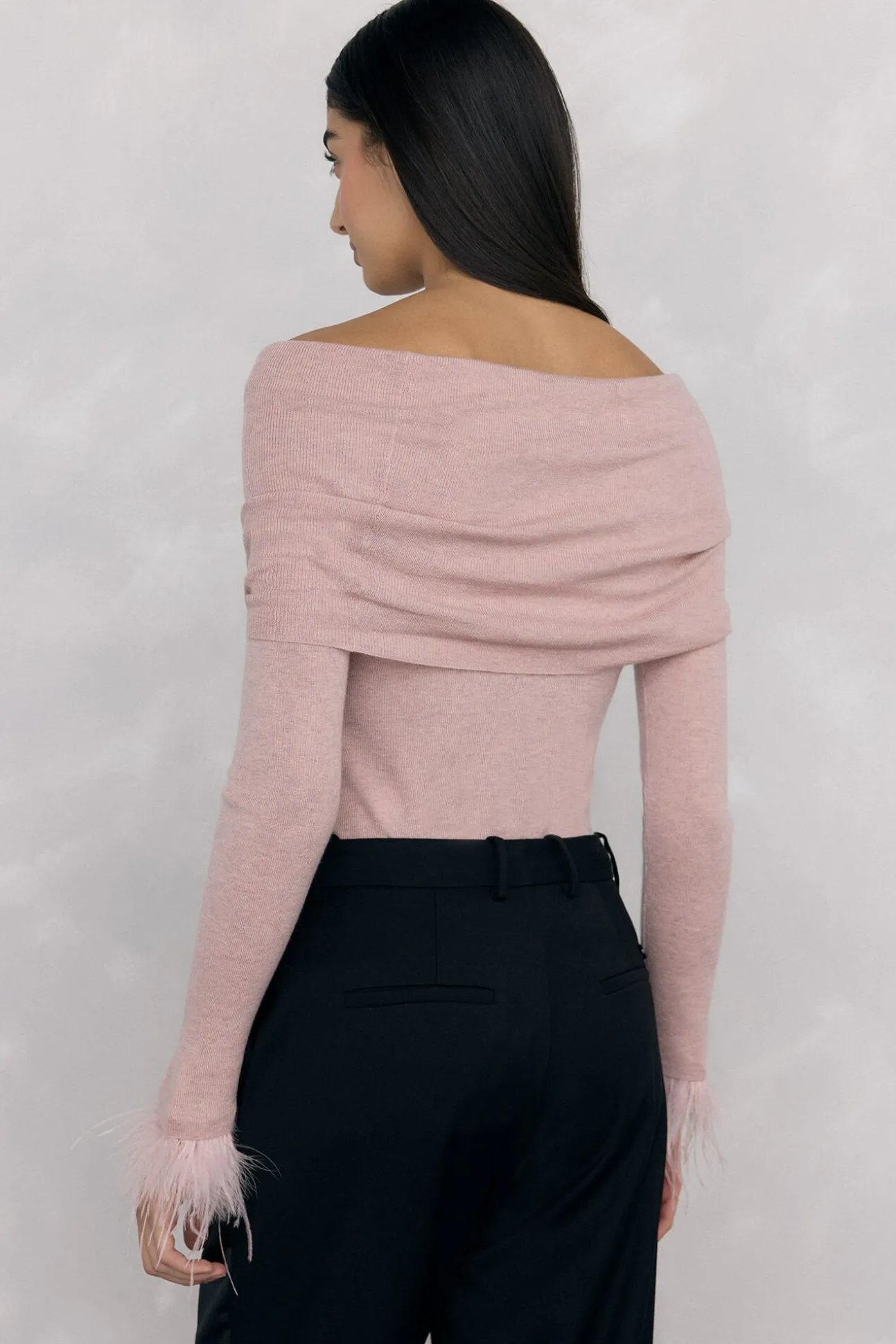 Jersey plumas puño