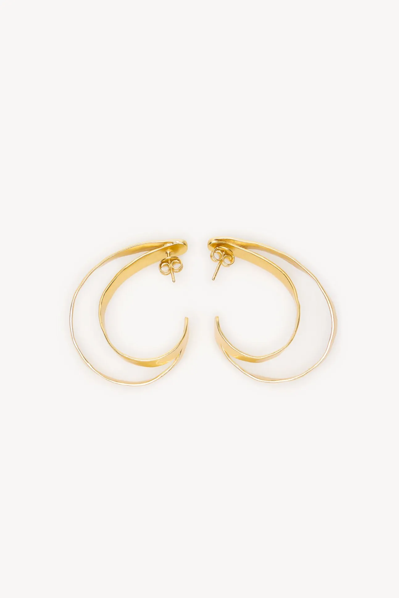 Melani. Aros bañados en oro