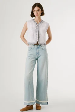 Pantalón denim wide leg con detalle en el bajo