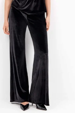 Pantalón largo de terciopelo elástico con diseño elegante
