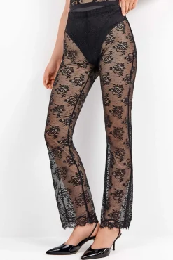 Pantalón largo elástico de encaje floral transparente y delicado