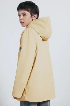 Parka amarillo pastel niño
